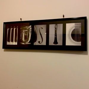 Black frame with word “Music” in photos